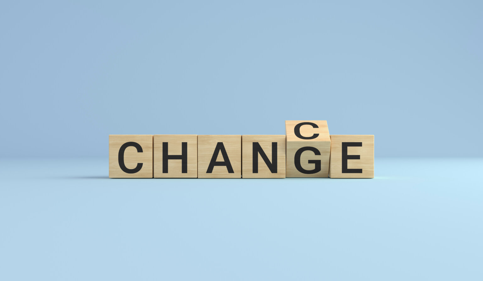 Text with each letter as a block showing 2 different words being "change" and "chance" representing that businesses have opportunities with a good model for managing complex change and handling change management