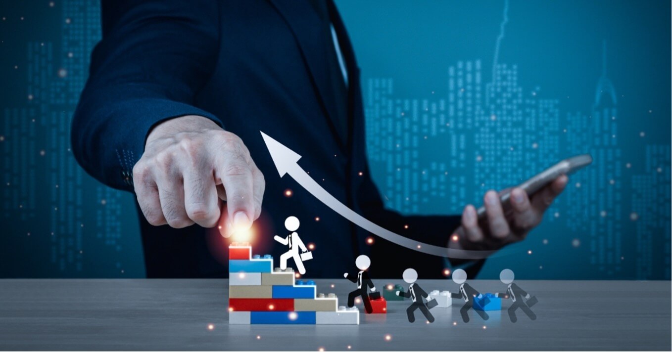 An illustrated image of a man's finger pointing upwards, signifying growth, accompanied by an animated character ascending a staircase, representing career advancement. This image serves as a metaphor for tracking professional progress.